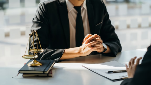 Business lawyer sitting at desk